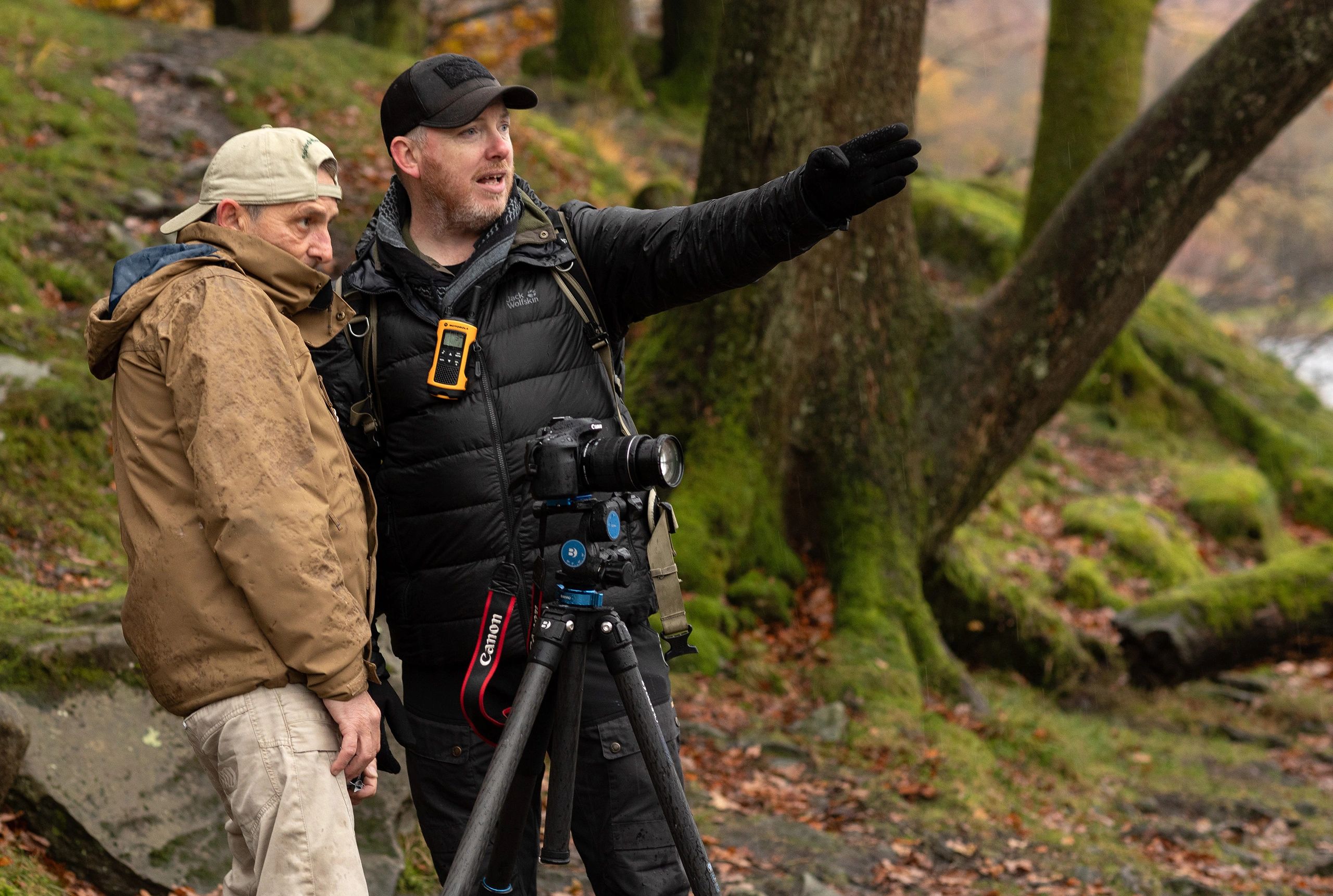 A photographic instructor helps a veteran with composing an image in the Lake District.