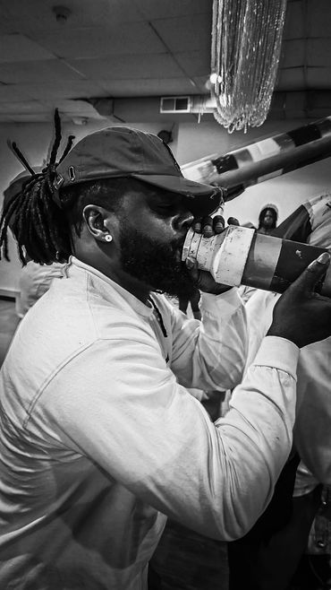 Jhonny Hyppolite musician of Rara Bel Poze performing with band