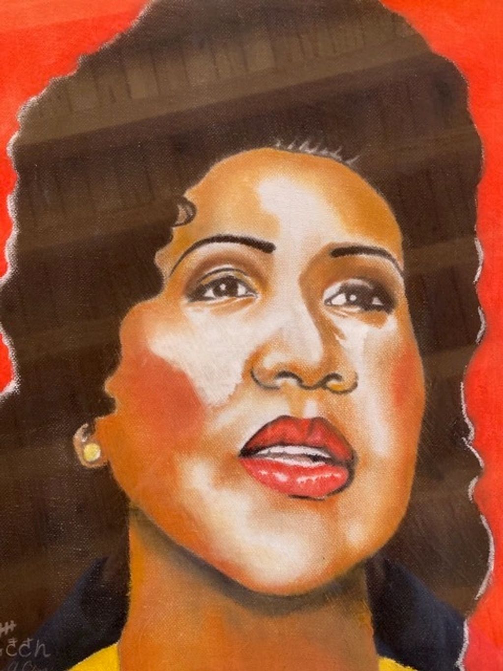 Colorful portrait of a woman with vibrant red lips and dark hair on a bright red background.