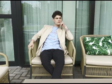 Keith in GMEN Khaki Jacket with Formula shirt.