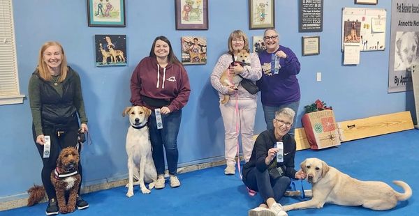 A graduating class of CGCA and Urban Dog students.