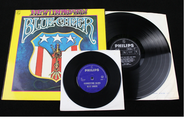 Vinyl records and album cover of Blue Cheer with a colorful design and Philips labels.