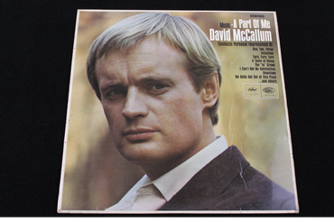 Album cover of David McCallum's 'A Part Of Me' with a close-up portrait.