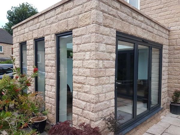 Aluminum Windows and bi fold doors in a conservatory