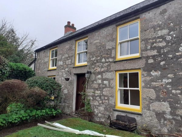 uPVC Sliding sash windows yellow