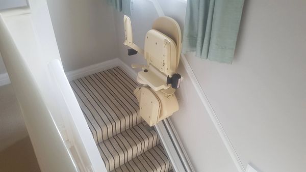 Happy clients able to easily access all parts of their property now due to a fitted stair lift