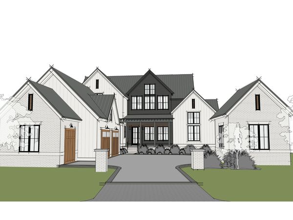 Modern farmhouse with black and white exterior and wooden garage doors.