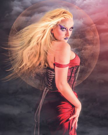 portrait of drag artist posing with confidence under soft directional light, fine art photography