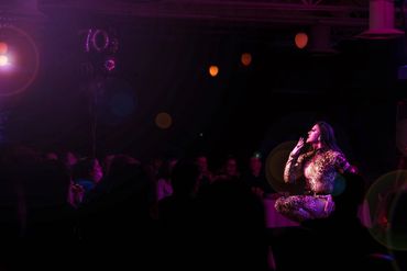 Fine art portrait of drag performer celebrating individuality and queer community through art.