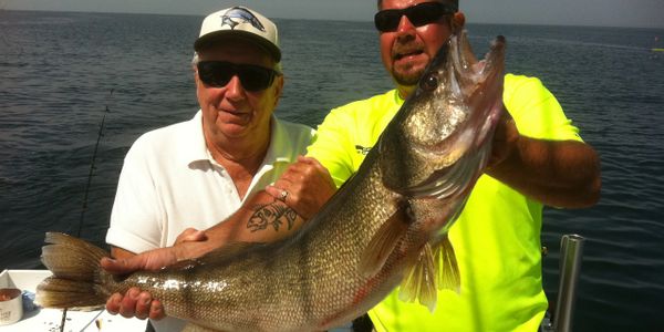 Captain Tim and Chuck with longest walleye