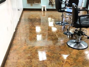 Tiled flooring buffed and waxed for a commercial hairdressers in Bedford, New Hampshire.
