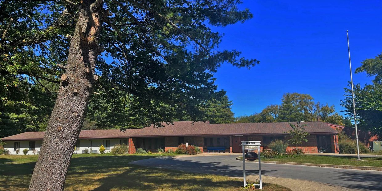 image of the outside building of OTB main campus on a beautiful sunny day