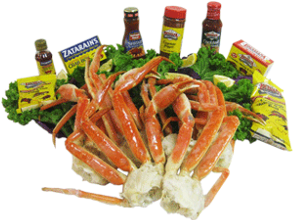 Snow crab legs with seasonings and sauces.