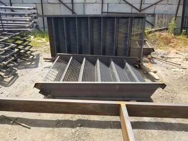 Stairs, Dumpster Gates, Rails and 8" x 8" angle processing and fabrication available.
