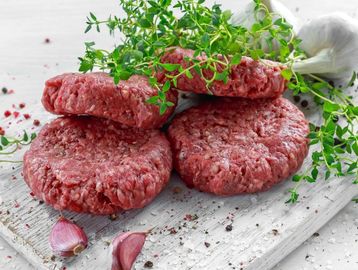 4 Quarter Pounder Aberdeen Angus Beef Burgers with salad. Born & reared in Malpas.