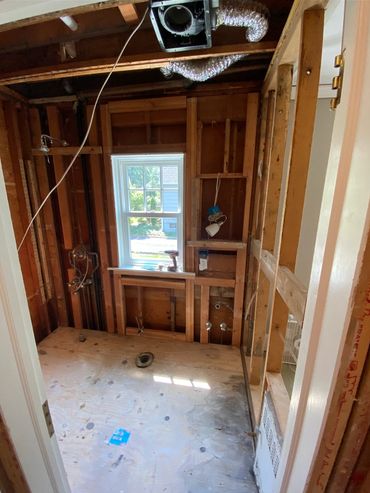 After small bathroom full gut job. Debris all removed and broom swept nicely.