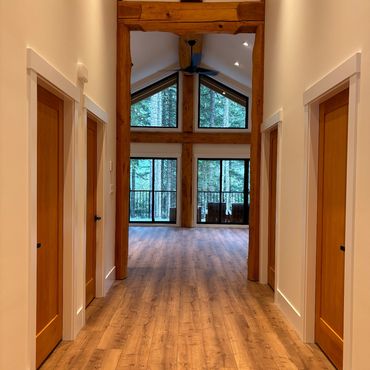 House interior with wood floors and beams
