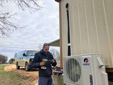 An Endless Comfort HVAC technician working on the installation of a Mini split near Columbia Tn.