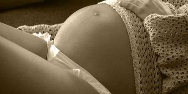 Mothers pregnant belly for maternity photo shoot by the artist Deprise Brescia