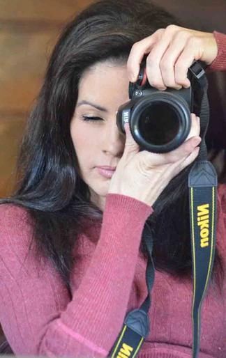 The contemporary energy artist Deprise Brescia with camera in hand.