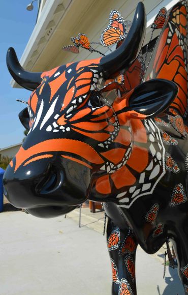 The face of a butterfly coe Moo Monarch by artist Deprise for Cow Parade SLO