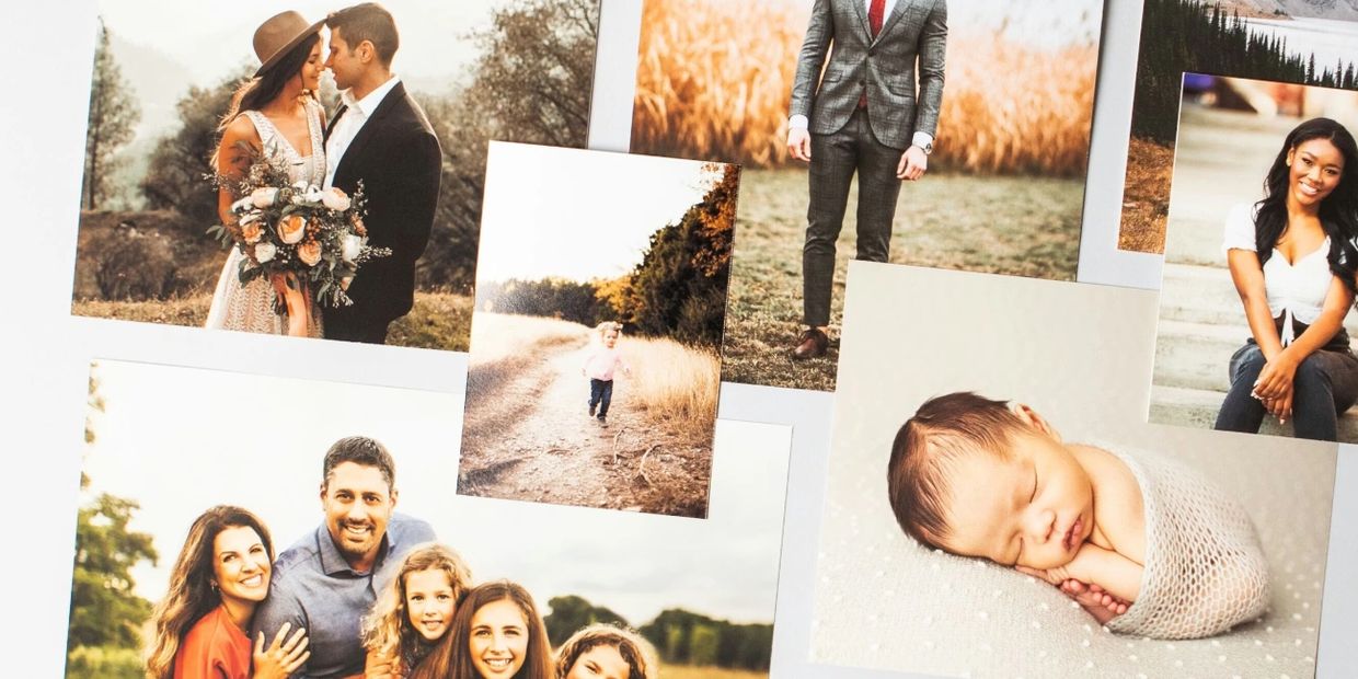 A collection of diverse family and individual portraits displayed on a surface.