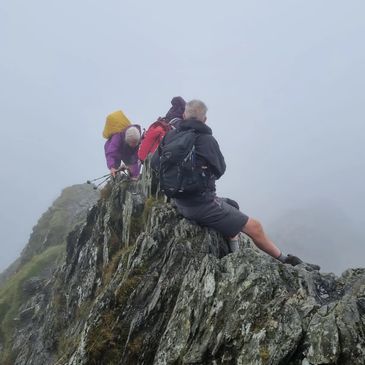  Photograph showing three of our members ascending Halls Fell Ridge on Blencathra