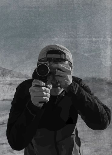 Person using a vintage camera outdoors in a textured, gray-scale style.