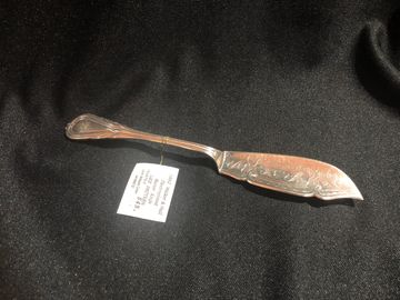 Lily pattern - Electroplated butter knife.  Walker & Hall 1892. 
SN 103740-0
