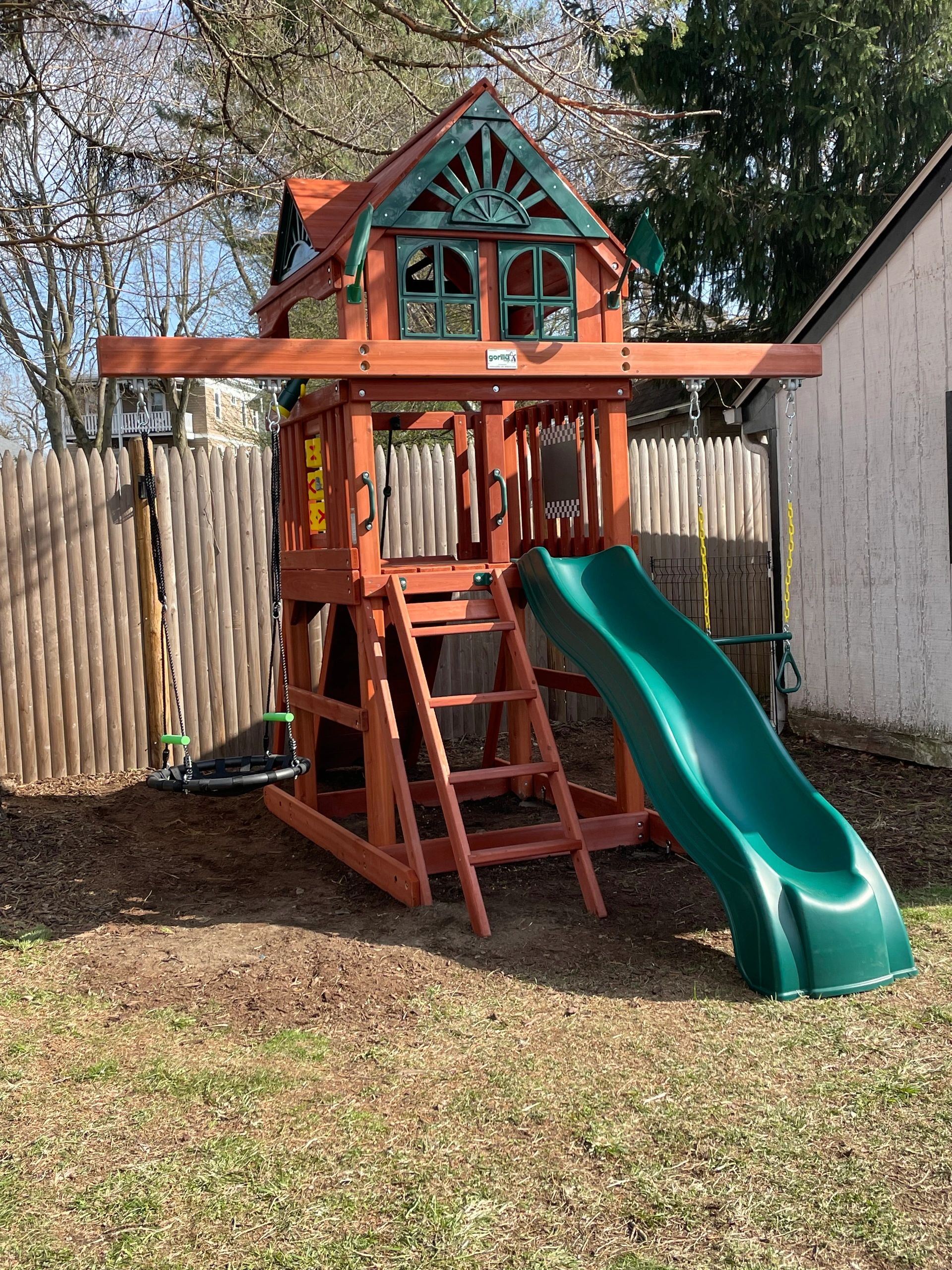 Outdoor playset for small spaces Concrete anchors
durable compact swingset slide rock wall Brookline