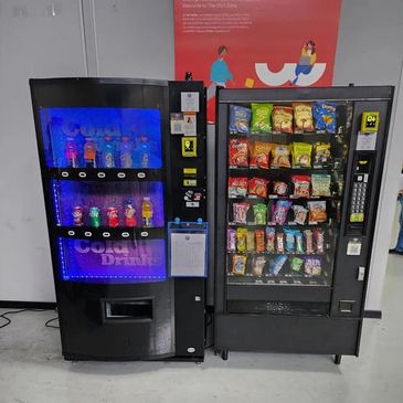 An example of available equipment. Snack and beverage machine set up on site.