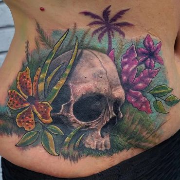 Scar coverup skull flower tropical Tattoo Rob Figueroa Tattoo Shop near me palm bay florida color