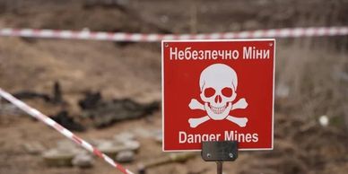 Danger Mines sign close up