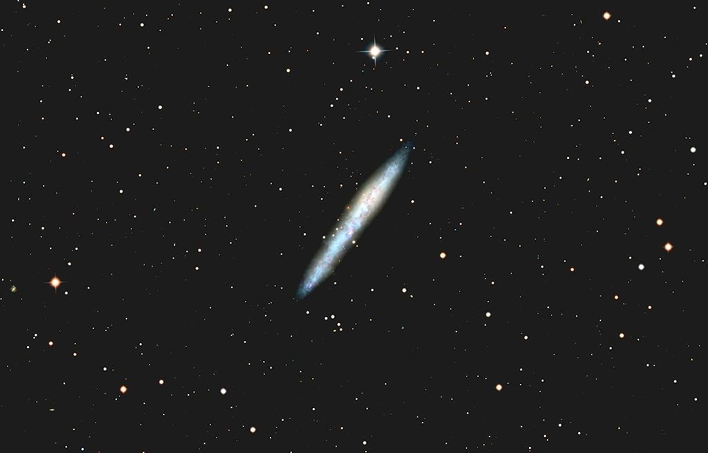 alt="IC 5052, an edge-on spiral galaxy in Pavo, featured by Hubble, imaged from Cohuna"