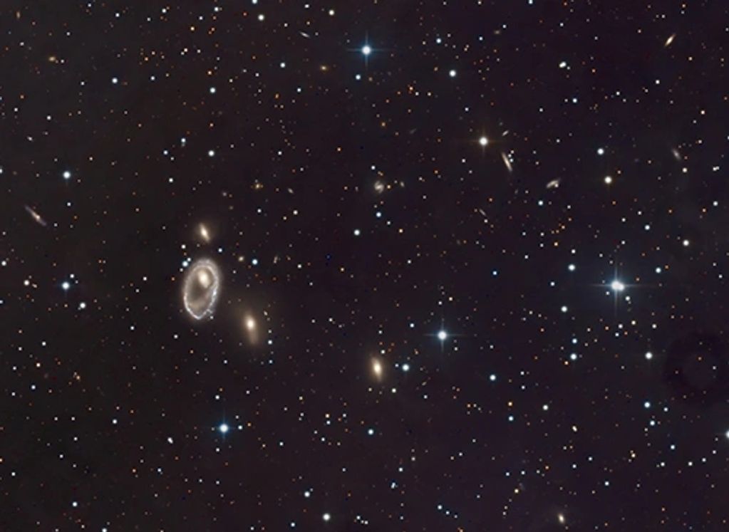 alt="Lindsay-Shapley Ring, a rare ring galaxy formed by a collision captured from Cohuna, Australia"