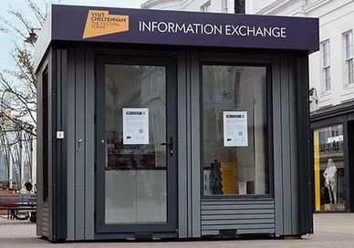 A bespoke, modular  information pod on a high street. Designed to be easily moved between locations.