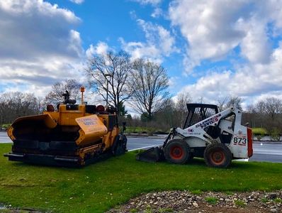 All American Paving asphalt contractor working on commercial jobsite