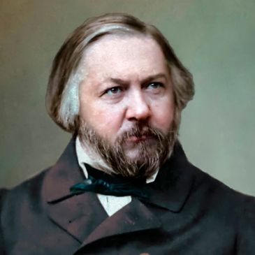 Portrait of a 19th-century man with beard and formal attire.