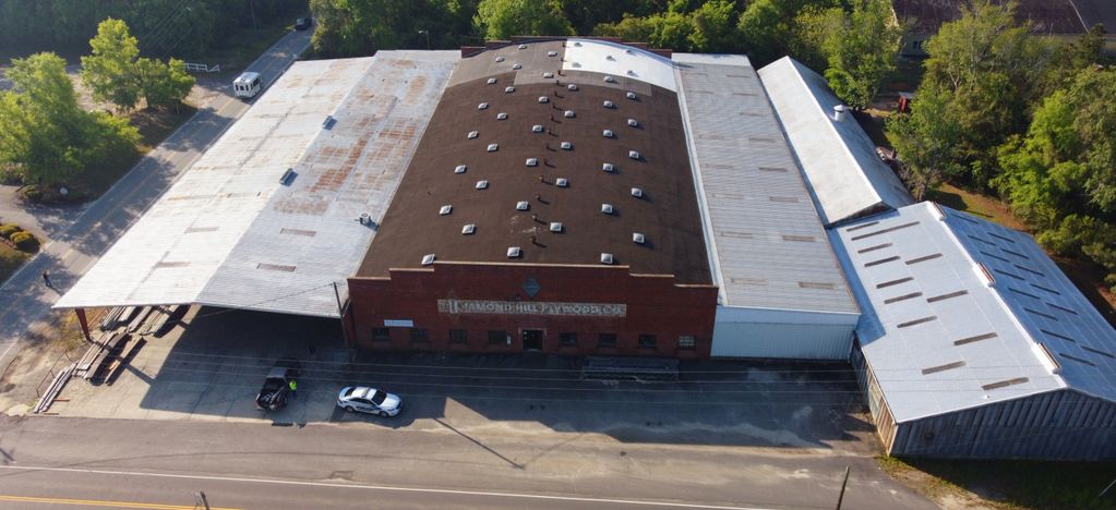 Plywood Warehouse roof restoration and coatings in Darlington South Carolina before work.