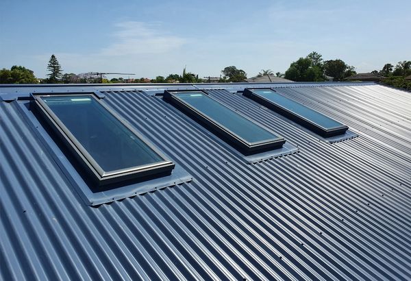 Tin metal roof skylight system.