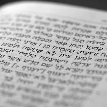 Close-up of Hebrew text on a page.