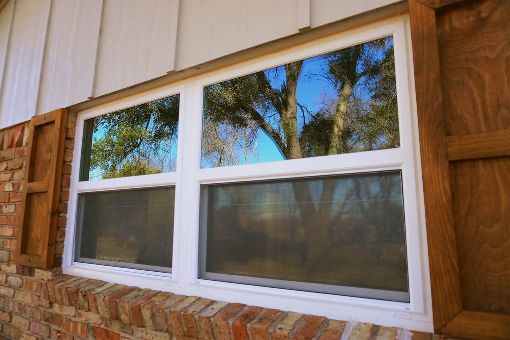 A custom mulled window  which expands the view and brightens this Texas Ranch.