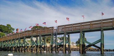 Magnolia pier with American flags