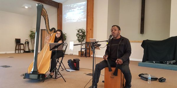 Leonard Patton and Tasha Smith Godinez perform for a World Hope International benefit concert.
