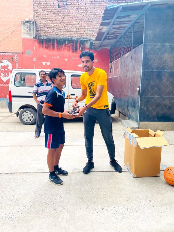 Shoes gifted to students at Don Bosco Ashalayam