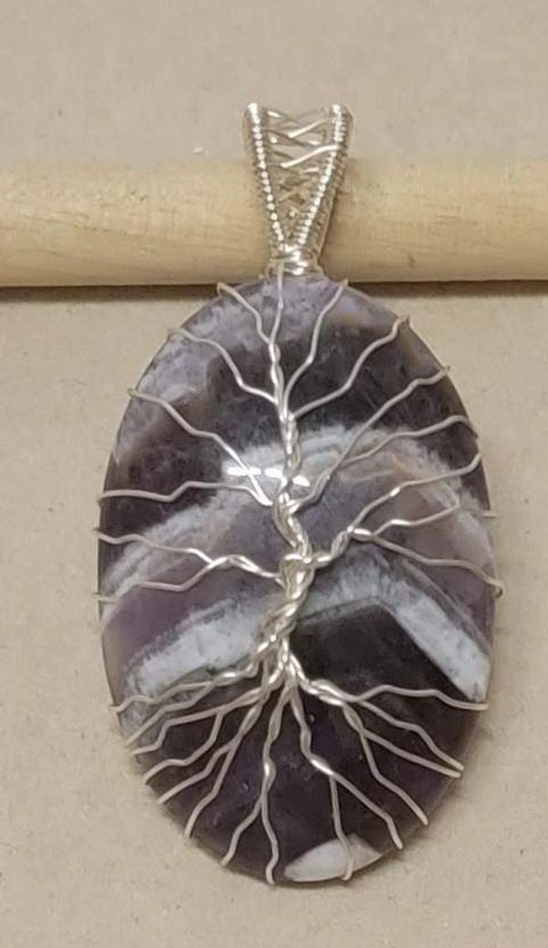 Tree of life pendant done by teacher, Crystal.