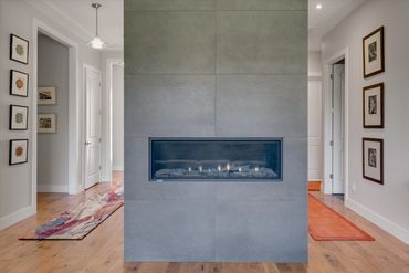 Gas fireplace with floor to ceiling tile
