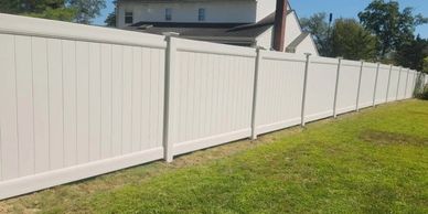 White PVC privacy fence.