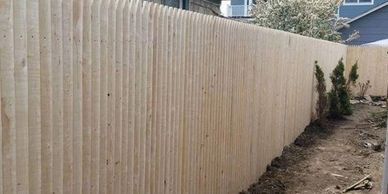 Stockade fence install.