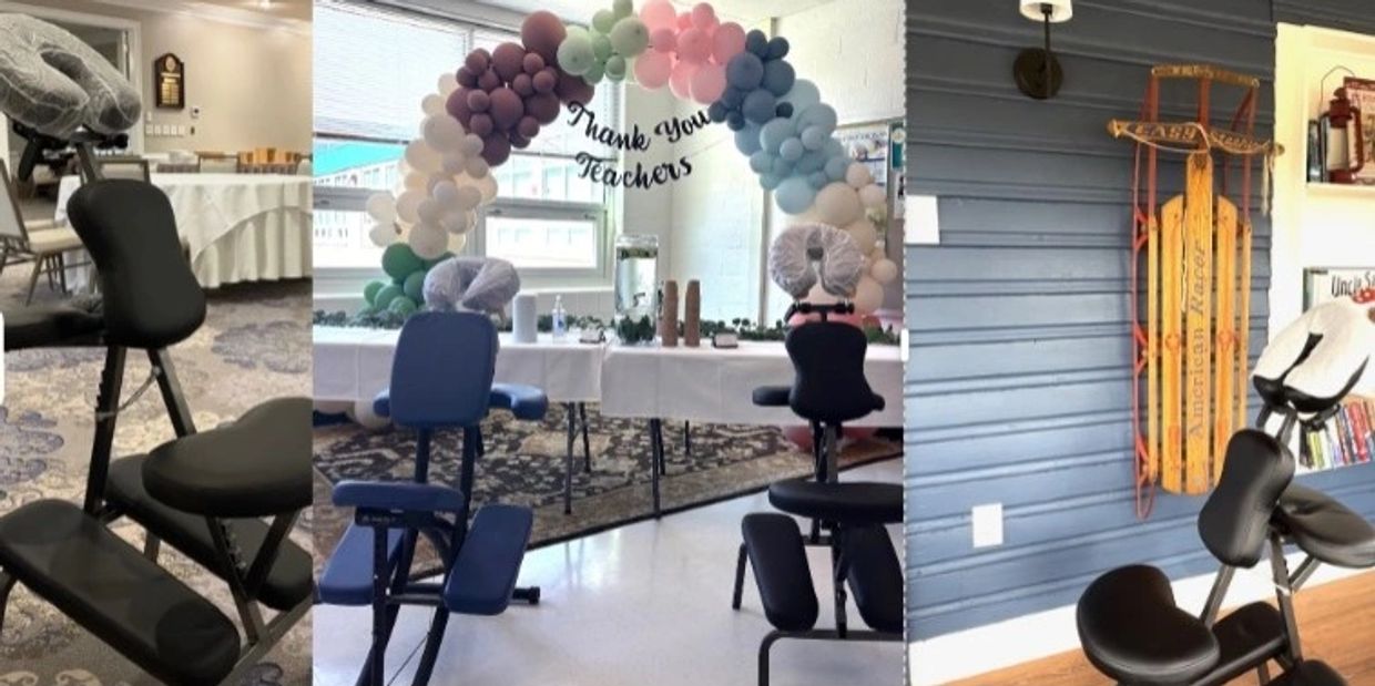 Massage chairs set up under a balloon arch with a thank you teachers sign.